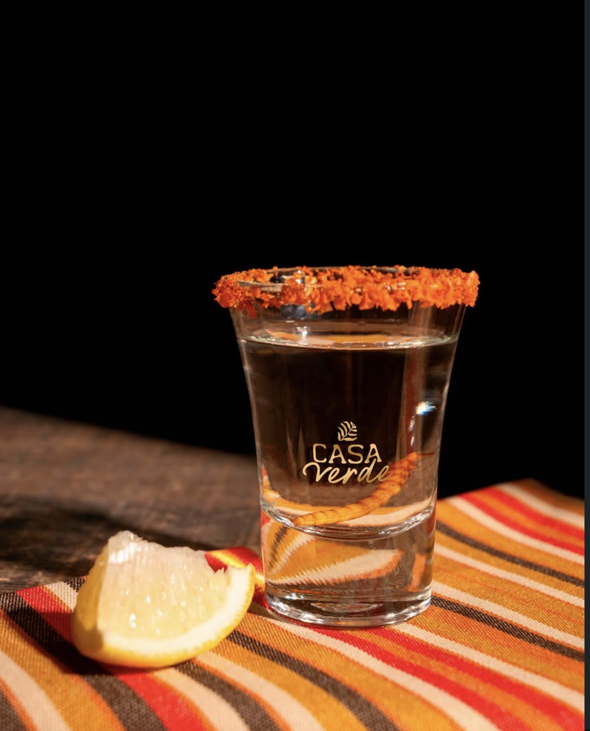 Tequila shot with the Casa Verde logo etched on the glass
